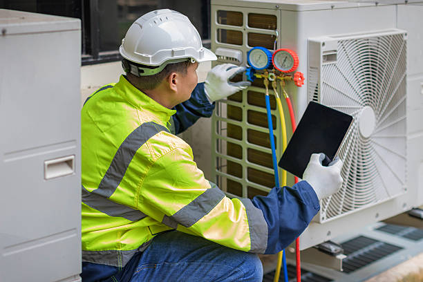 Professional Emergency Hvac technician working in O Fallon, MO